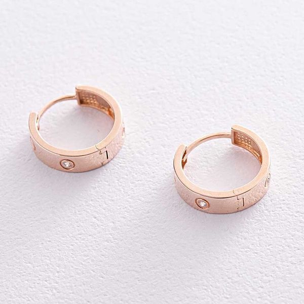 Серьги кольца с фианитом в красном золоте 038407 038407 фото