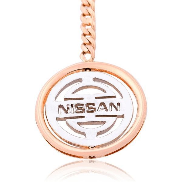 Брелок для ключів Nissan з червоного і білого золота золота 033005 033005 фото