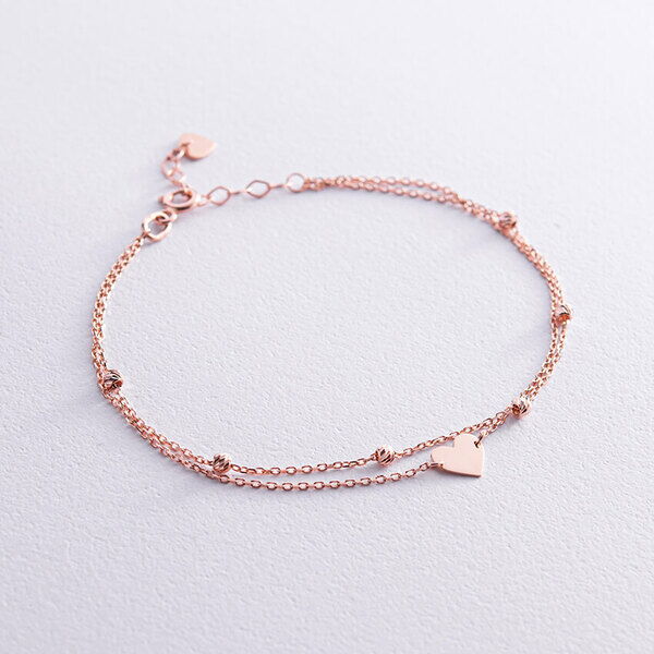 Золотой двойной браслет в красном золоте с шариками и сердечком 037978 детальное изображение ювелирного изделия Женские золотые браслеты Золотой двойной браслет в красном золоте с шариками и сердечком 037978 детальное изображение ювелирного изделия Женские золотые браслеты