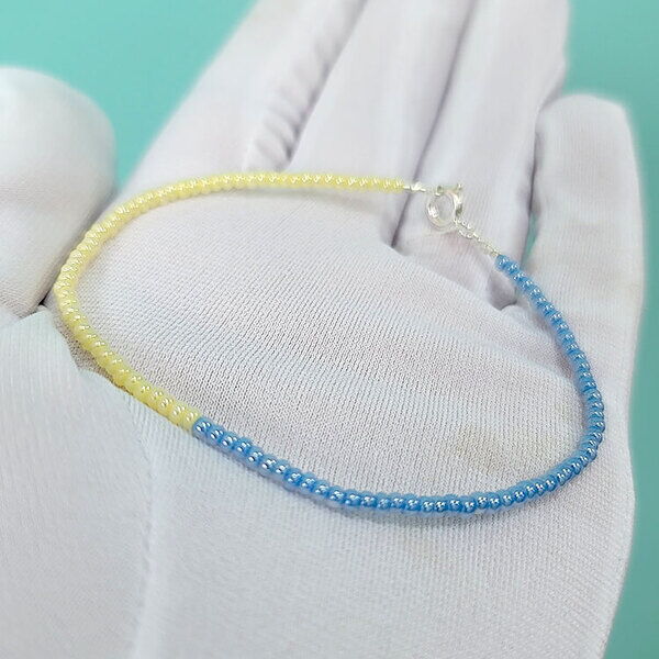 Браслет желто-голубой Украина с  серебряным замком 925 пробы 037251 детальное изображение ювелирного изделия Серебряные браслеты Браслет желто-голубой Украина с  серебряным замком 925 пробы 037251 детальное изображение ювелирного изделия Серебряные браслеты