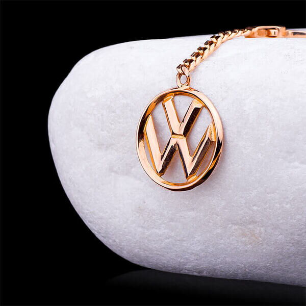 Брелок с логотипом Volkswagen из золота 585 пробы  Брелок с логотипом Volkswagen из золота 585 пробы