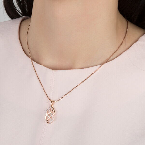 Золотой кулон. Фото