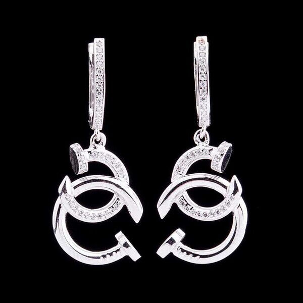 Золотые серьги гвозди с фианитами 038459 детальное изображение ювелирного изделия Золотые серьги с фианитом Золотые серьги гвозди с фианитами 038459 детальное изображение ювелирного изделия Золотые серьги с фианитом