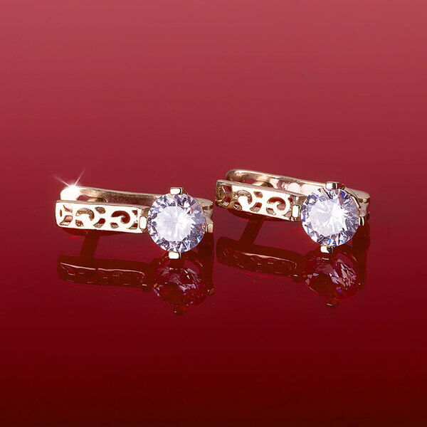 серьги с ажурным узором из золота