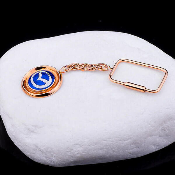 Золотой брелок с синей эмалью Mazda 033012 детальное изображение ювелирного изделия Брелок из золота Золотой брелок с синей эмалью Mazda 033012 детальное изображение ювелирного изделия Брелок из золота