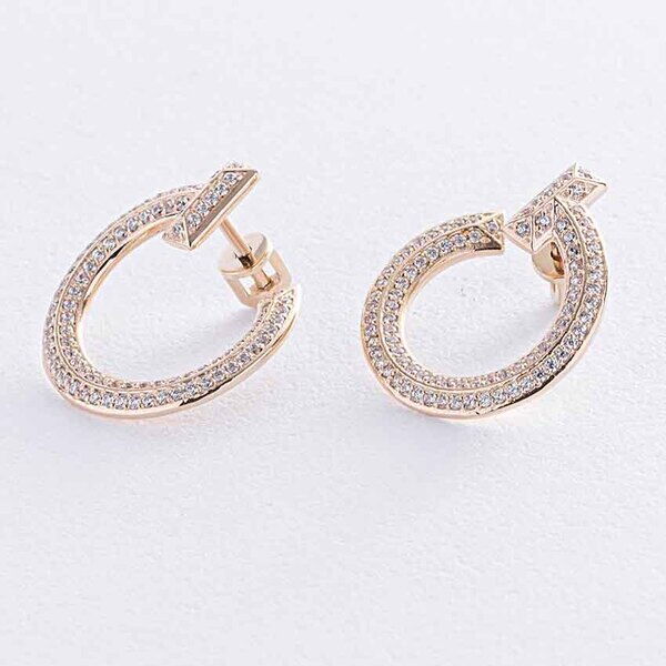 Стильні золоті сережки-пусети з фіанітами 038393 детальне зображення ювелірного виробу Стильні золоті сережки-пусети з фіанітами 038393 детальне зображення ювелірного виробу