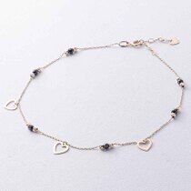 обзорное фото Браслет на ногу в желтом золоте с черными фианитами, ажурными шариками и сердечками 039069  Золотые браслеты с цирконием (фианитами)