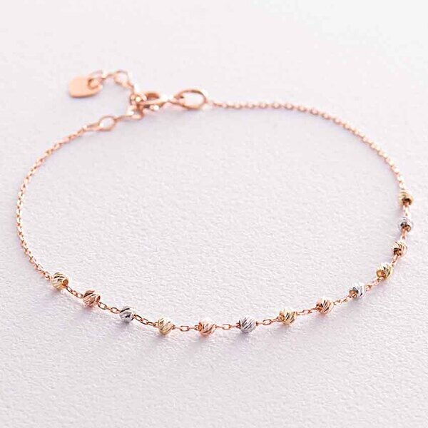 Золотий браслет з ажурними кульками в комбінованому золоті 039116 детальне зображення ювелірного виробу Золотий браслет з ажурними кульками в комбінованому золоті 039116 детальне зображення ювелірного виробу