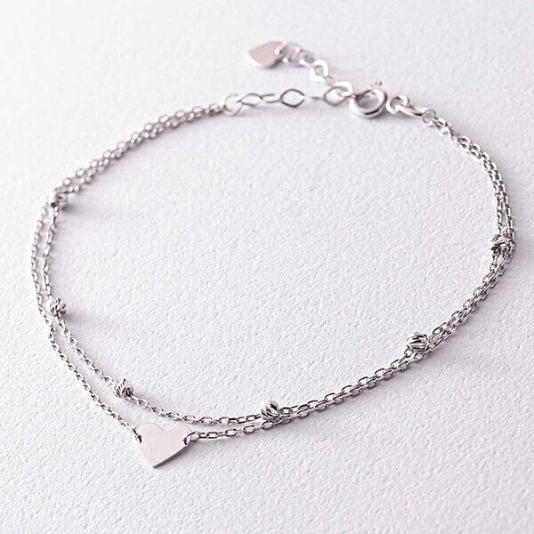 Двойной браслет в белом золоте с шариками и сердцем 038735 детальное изображение ювелирного изделия Золотые браслеты без камней Двойной браслет в белом золоте с шариками и сердцем 038735 детальное изображение ювелирного изделия Золотые браслеты без камней