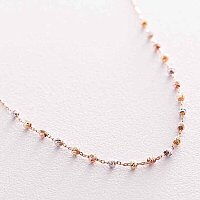 Золотое колье с ажурными шариками в комбинированном золоте 039115