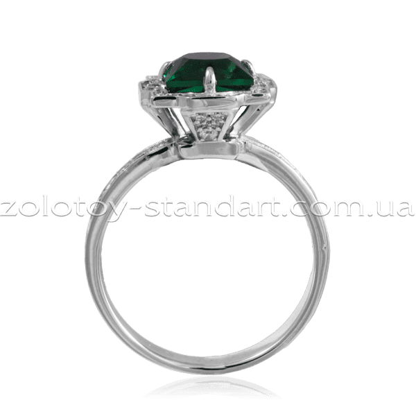 Золотое кольцо с бриллиантом и изумрудом фото