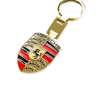 обзорное фото Золотой брелок на ключи от машины Porsche 036491 Брелок из золота обзорное фото Золотой брелок на ключи от машины Porsche 036491  Брелок из золота