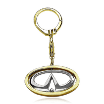 обзорное фото Золотой брелок с логотипом Infiniti 036477 Брелок из золота обзорное фото Золотой брелок с логотипом Infiniti 036477  Брелок из золота