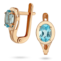 обзорное фото Золотые серьги с голубым топазом овальной огранки с рамкой, подчёркивающей его форму 040637 Золотые серьги с топазом обзорное фото Золотые серьги с голубым топазом овальной огранки с рамкой, подчёркивающей его форму 040637  Золотые серьги с топазом