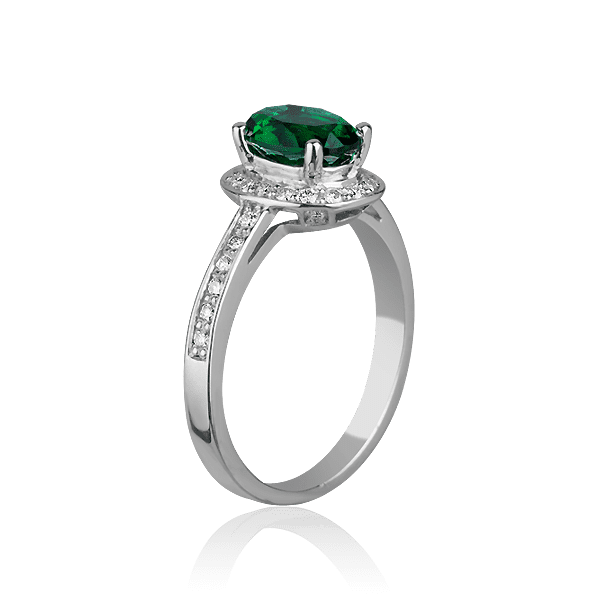 Золотое кольцо с изумрудом и бриллиантами Золотое кольцо с изумрудом и бриллиантами