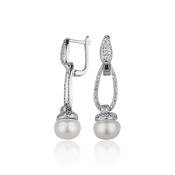 Серебряные серьги с жемчугом и фианитами 028001 детальное изображение ювелирного изделия Серебряные серьги с камнями Серебряные серьги с жемчугом и фианитами 028001 детальное изображение ювелирного изделия Серебряные серьги с камнями