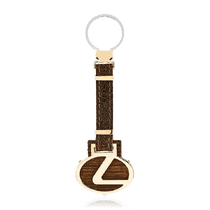 обзорное фото Золотой брелок с кожей Lexus 036484 Брелок из золота обзорное фото Золотой брелок с кожей Lexus 036484  Брелок из золота