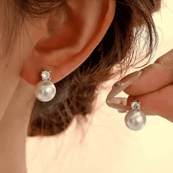 Сережки гвіздки з перланою та фіанітом купити Сережки гвіздки з перланою та фіанітом купити