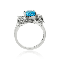 обзорное фото Массивное кольцо из белого золота с топазом и бриллиантами 036756 Золотые кольца обзорное фото Массивное кольцо из белого золота с топазом и бриллиантами 036756  Золотые кольца