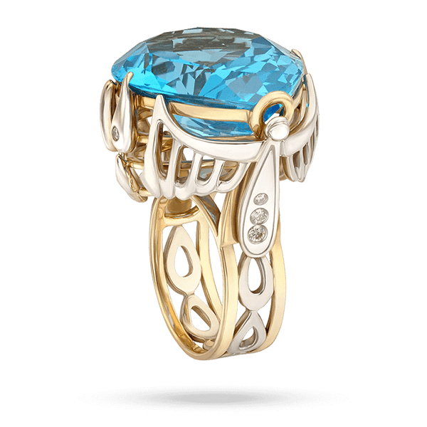 Золотое кольцо с топазом органки груша и декором в форме стекающих капель с бриллиантами