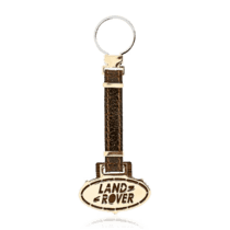 обзорное фото Золотой брелок для ключей с логотипом LandRover 036492  Брелок из золота