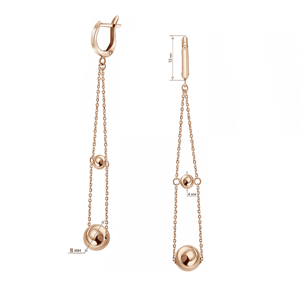 Изысканные длинные золотые серьги с изящными цепочками, украшенными шариками разного размера на английском замке Изысканные длинные золотые серьги с изящными цепочками, украшенными шариками разного размера на английском замке