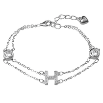 обзорное фото Двойной серебряный браслет с буквой Н в белых фианитах и дополнительной цепочкой 039750 Серебряные женские браслеты обзорное фото Двойной серебряный браслет с буквой Н в белых фианитах и дополнительной цепочкой 039750  Серебряные женские браслеты