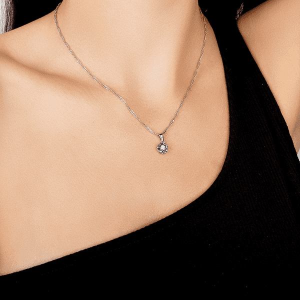 Подвеска из белого золота цветок с сапфирами Подвеска из белого золота цветок с сапфирами