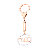 обзорное фото Золотой брелок для ключей с логотипом Audi 032990 Брелок из золота обзорное фото Золотой брелок для ключей с логотипом Audi 032990  Брелок из золота