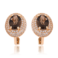 Золоті сережки овальної форми з раухтопазом і фіанітами 034594