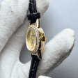 золотые часы с кожаным ремешком